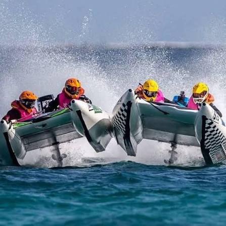 Aquacat race boats jumping a wave
